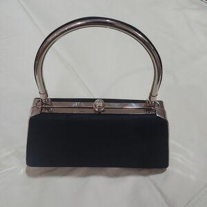 Black structured fabric evening bag with silverstone frame, handle and chain